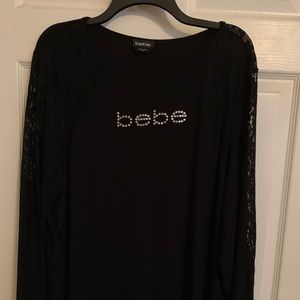 Black Bebe shirt with lace sleeves